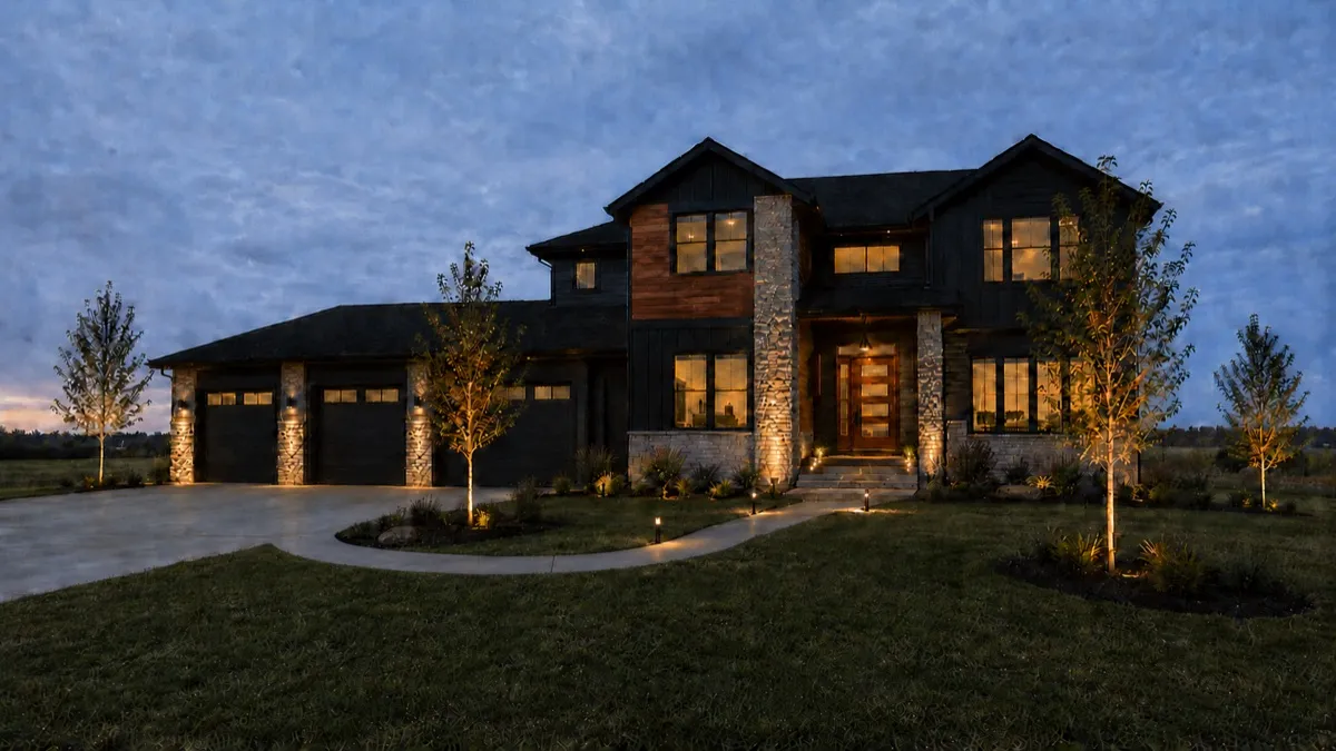 Landscape Lighting — brass path lights at blue hour
